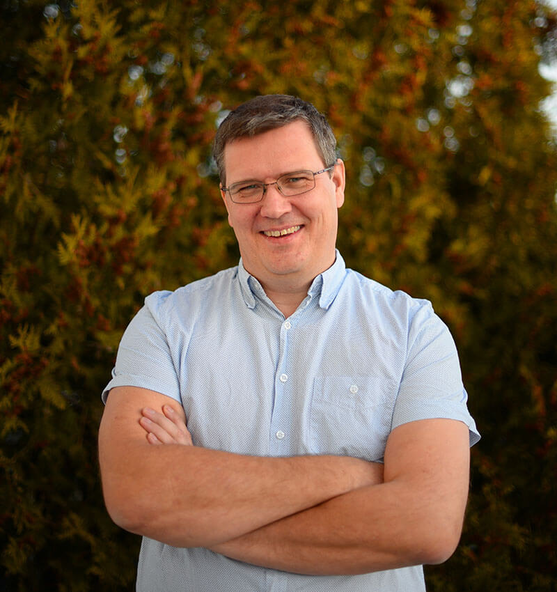 Portrettbilde av Jørn Angeltveit, som jobber med årsoppgjør i Tripletex.
